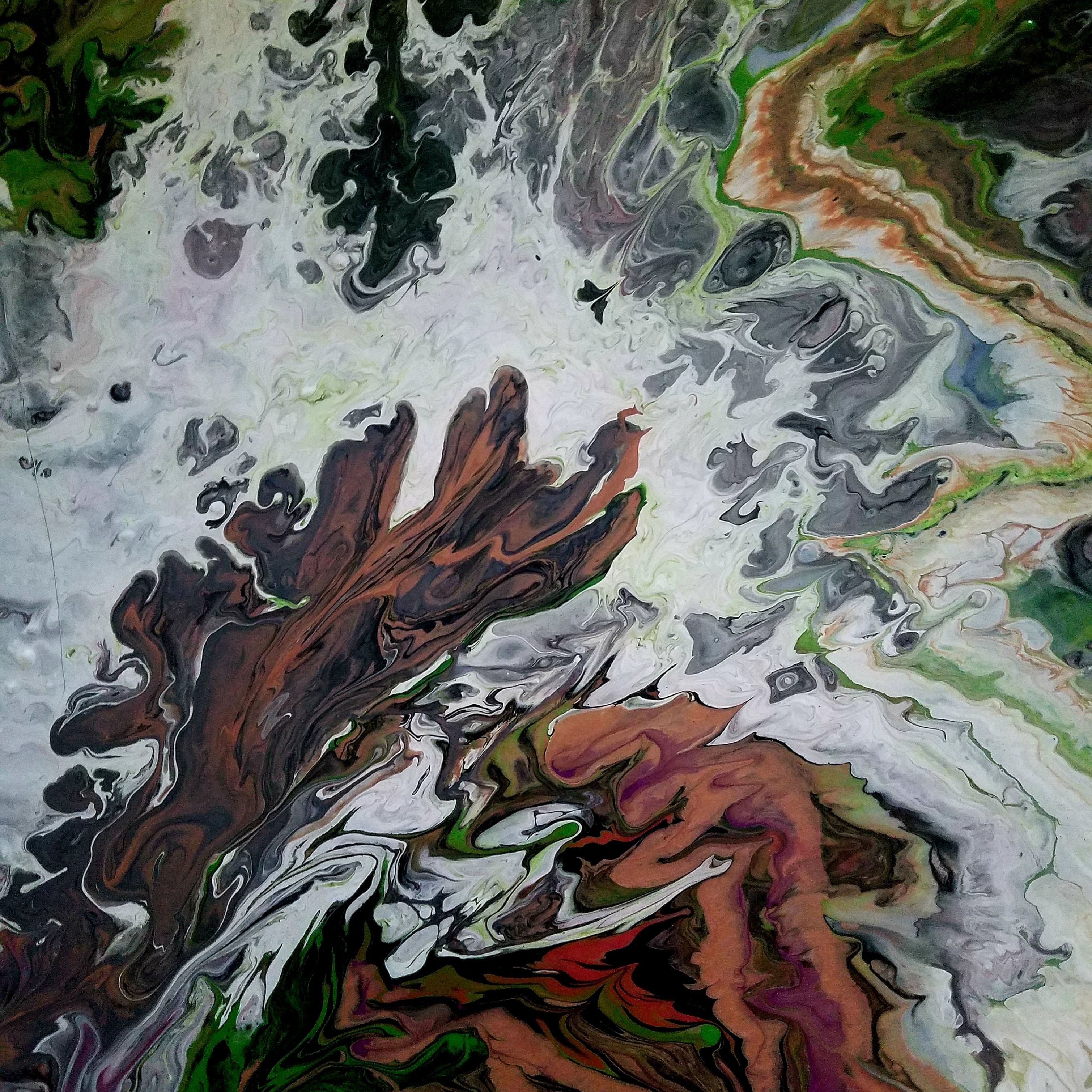 Acrylic pour painting in earthy greens, brown, and grey with forms suggesting an aerial view of forest floor or geological strata